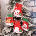 Set de 4 calcetines de Navidad con lentejuelas de Papá Noel, Reno, Oso y Muñeco de nieve - Juego de Patrones Surtidos