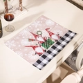 Christmas table mat with festive gnomes and black white plaid border on wood table - Black And White Plaid Placemat