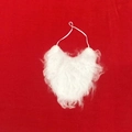 Detail showing white Santa Claus beard with elastic strap on a vibrant red background - Child Style (Open)