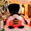 Illuminated Christmas gnome nutcracker soldier with red fabric body and warm LED lights - Red