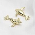 Macro view of gold-plated whale charms with smooth lines and detailed textures for DIY jewelry - Gold Whale Style (2#)