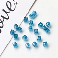 Close-up of faceted lake blue crystal cube beads for DIY jewelry making and earrings - Sky Blue