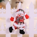 Christmas snowman plush ornament featuring red plaid fabric and a warm holiday hat - Plaid Fabric Snowman Style
