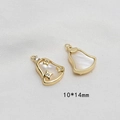 Dettaglio di pendente a campana 10x14mm con zircone a stella e inserto in madreperla - Stile Campanella a Stella (8# Prezzo Singolo)