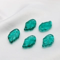 Macro detail of transparent emerald green glass leaf charms with realistic vein textures - Dark Green