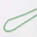 Macro shot of light green faceted crystal spacer beads for DIY jewelry making - 1 Piece / Light Green