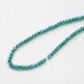 Macro shot of faceted green crystal rondelle beads for DIY jewelry making and craft projects - 1 Piece / Dark Green