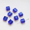 Macro detail of dark blue square glass beads with silver foil interior for DIY jewelry - Denim Blue