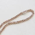 Macro view of 4mm faceted champagne bicone crystal beads for DIY jewelry making - 7# Light Coffee