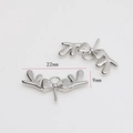 Detailed view of silver deer antler bow jewelry charms with 22mm x 9mm dimensions - Bow Antler Style / White Gold
