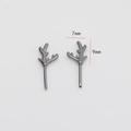 Macro view showing 7mm by 9mm dimensions of vintage antler studs in dark gunmetal finish - Small Antler Style / Gunmetal