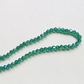 Macro shot of 4mm faceted green crystal beads with AB coating for DIY jewelry making - Dark Green
