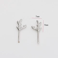 Detail view of small silver antler stud earrings with 7mm and 9mm size dimensions - Small Antler Style / White Gold