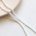 Macro view of 3mm white faceted crystal wheel beads for DIY jewelry making - 3# Solid White