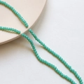Macro detail of 3mm mint green faceted crystal beads for DIY jewelry making and necklaces - 5# Lake Green