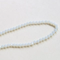 Close-up of 4mm faceted opal white bicone crystal beads for DIY jewelry making - 18# White