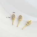 Macro view of gold-plated rabbit ear components with micro-pave zircons for DIY jewelry - Gold Zircon Rabbit Ears
