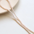 Close-up of 3mm faceted dusty pink crystal beads for DIY jewelry and necklace crafting - 17# Apricot