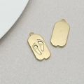 Macro detail of gold-plated rectangular pendants with baby footprint embossed relief - Rectangular Footprint Style (5#)