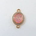 Detail of pink opal pendant with zircon halo and gold plated double loop connectors - Light Pink Oval (D1685)