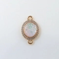 Macro shot of gold oval moon pendant with glittering sequins and zircon for DIY jewelry - White Oval (D1685)