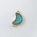 Macro shot of gold crescent moon connector with blue shimmer resin for DIY jewelry - Water Blue Moon (D1685)