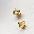 Macro view of 18K gold-plated bell-shaped pearl cup bails with threaded pins for jewelry - Clown Hat Gold