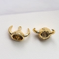Macro shot of 18K gold plated bull horn helmet charms for DIY baroque pearl jewelry - Bull King Hat / Gold