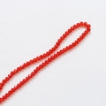 Macro shot of 3.5mm faceted red crystal beads for DIY jewelry making and necklaces - Bright Red