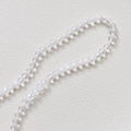 Détail macro de perles de cristal clair facettées de 3,5 mm pour la création de bijoux - Blanc Transparent