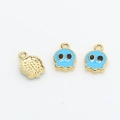 Detailed view of pixel ghost charms with gold plating and blue enamel finish - 7# Blue Octopus