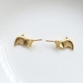 Macro shot of gold-plated bat wing stud earrings for DIY baroque pearl jewelry making - Small Bat Wings / Gold