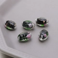 Close-up of five handmade lampwork glass oval beads with pink flowers and gold leaf details - 13# Black