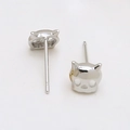 Macro view of silver cat skull earrings showing hollow design and secure stud back - Silver Mask Style