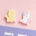 Detail view of cute resin unicorn charms with colorful mane for DIY jewelry and hair crafts - Sitting Unicorn (3#)