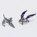 Macro detail of dark gothic rabbit ear pendants with purple enamel and gemstones - Gun Black Style