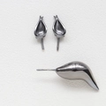 Macro shot of dark metallic Baroque fox ear pendant components with smooth polished finish - 2 Ears + 1 Tail / Gunmetal
