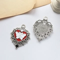 Macro view showing both sides of a red heart butterfly alloy pendant with hollowed lace - Silver Base White Butterfly (D1907-7)