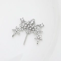 Detailed view of silver floral crown base with zircon inlays and heart shaped cutout - White Gold