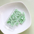 Macro view of cylindrical tube beads with vintage green stripes for DIY jewelry making - 1 Box (Approx. 10g) / 1# Green and White Striped