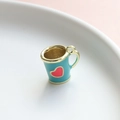 Close-up of blue enamel heart cup charm with gold handle for DIY jewelry making - Blue Cup