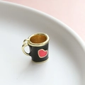 Macro shot of miniature enamel heart cup charm for DIY jewelry and keychain accessories - Black Cup