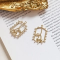 Macro view of gold cherry pendants with faux pearls and intricate wave texture detail - Cherry Style (3#)