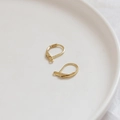 Close-up of gold-plated leverback earring hooks for DIY jewelry making on white ceramic - 4# 18k Gold Curved Leverback Hook