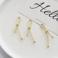 Detail of gold-plated hollow diamond knot pendants for DIY earring jewelry making - Knot Shape (Style 1)