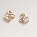 Detailed close-up of golden swan nail charms with sparkling rhinestones and flower pattern - Diamond Flower Swan Style (94#)