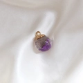Handmade clear glass ball pendant with purple dried flowers and gold metal cap - Purple