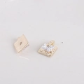 Golden square zircon nail charm pendants with intricate relief engraving on a beige base - 19#