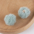 Macro detail of mint green plush pompom balls with golden metal shanks for DIY crafts - 4# Bean Paste Green