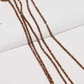 Faceted bronze crystal glass beads showing reflective metallic surface for DIY jewelry making - Golden Coffee